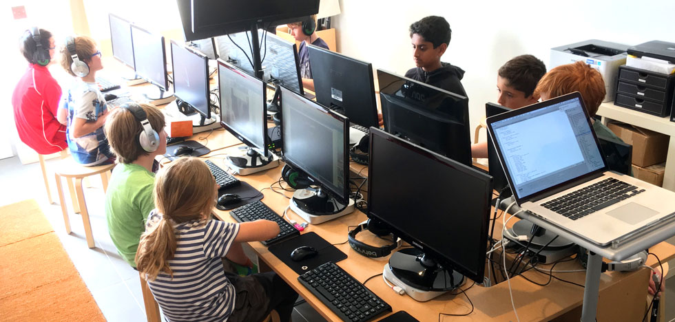 Games design code club students at their workstations